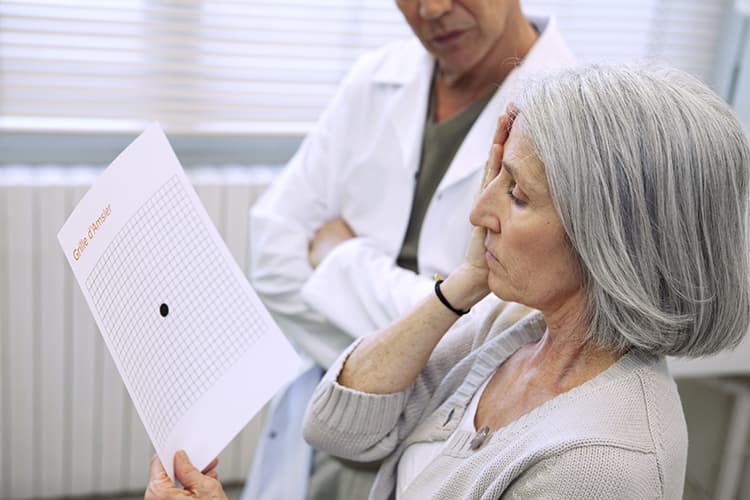 woman looking at amsler grid